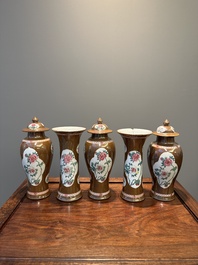 A Chinese capucin-brown-ground famille rose garniture of five vases with floral design, Yongzheng/Qianlong