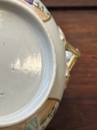 A Chinese Canton famille rose covered bowl and a matching plate, 19th C.