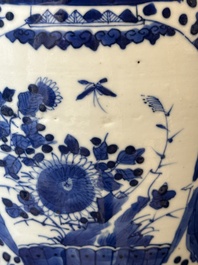 A pair of Chinese blue and white jars and a vase, Kangxi mark, 19th C.