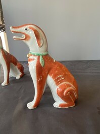 A pair of Chinese polychrome export porcelain models of dogs, Qianlong