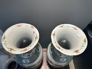 A pair of Chinese famille rose vases with narrative design, 19th C.