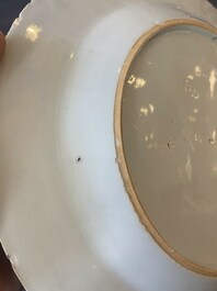 A pair of Chinese gilt puce-enamelled 'harbor view' plates, Qianlong