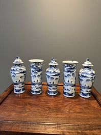 A Chinese blue and white garniture of five vases with landscape design, 19th C.