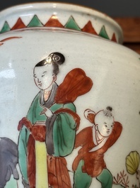 A small Chinese wucai jar with figures in a landscape, Transitional period