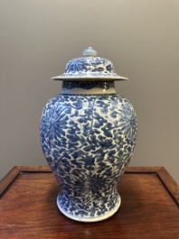 A Chinese blue and white 'lotus scroll' vase and cover, Kangxi