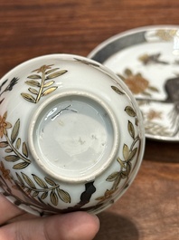 A pair of Chinese grisaille and gilt 'pheasant' cups and saucers, Yongzheng