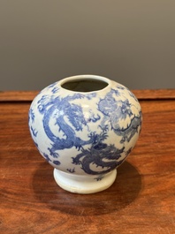 A pair of Chinese blue and white covered vases and three jars, 19th C.