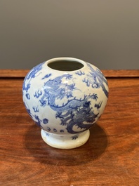 A pair of Chinese blue and white covered vases and three jars, 19th C.