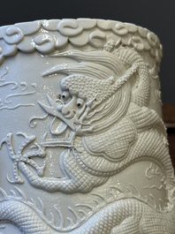 A Chinese monochrome white-glazed biscuit brush pot, signed Wang Bingrong 王炳榮, 19/20th C.