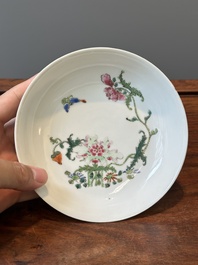 A pair of Chinese famille rose 'peony and butterfly' plates, Yongzheng/Qianlong