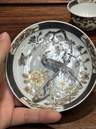 A pair of Chinese grisaille and gilt 'pheasant' cups and saucers, Yongzheng