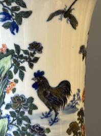 A Chinese doucai 'gu' vase with roosters, Qianlong mark, 19th C.