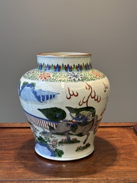 A Chinese wucai 'qilin' baluster vase, 19th C.