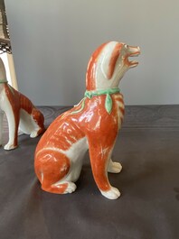 A pair of Chinese polychrome export porcelain models of dogs, Qianlong