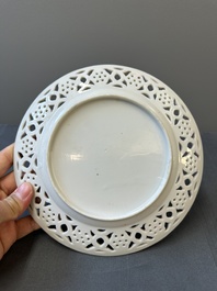 A pair of Chinese blue and white Canton-decorated plates, a famille rose 'playing boys' plate and a reticulated plate, 19th C.