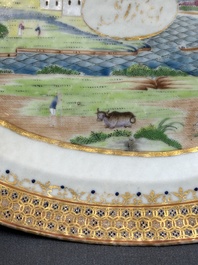 An oval Chinese monogrammed Canton famille rose dish with landscape design, 19th C.