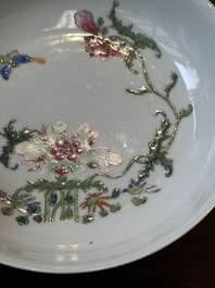 A pair of Chinese famille rose 'peony and butterfly' plates, Yongzheng/Qianlong