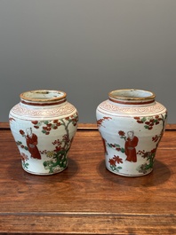 A pair of small Chinese wucai jars with figures in a landscape, Transitional period