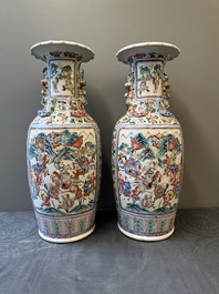 A pair of Chinese famille rose vases with narrative design, 19th C.
