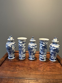 A Chinese blue and white garniture of five vases with landscape design, 19th C.