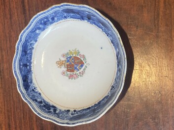 A Chinese famille rose armorial cup and saucer, Qianlong