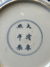 A pair of Chinese blue and white 'Mongolian hunting scene' plates and a pair of plates with floral design, Chenghua and Kangxi mark, Kangxi