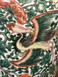 A pair of Chinese wucai 'phoenix and peony scroll' vases, Transitional period