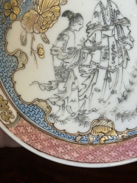A Chinese famille rose and grisaille 'Xiwangmu receiving a peach' cup and saucer, Yongzheng
