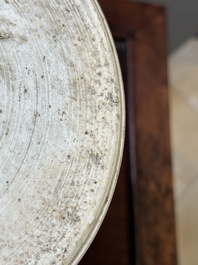 A Chinese blue and white 'lotus scroll' jar with wooden cover and stand, Kangxi
