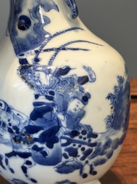 A Chinese blue, white and copper-red vase with warriors on horseback, Qianlong mark, 19th C.