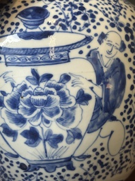 A pair of Chinese blue and white covered vases and three jars, 19th C.