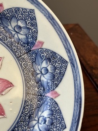 A Chinese famille rose 'lotus' plate for the Southeast Asian market and a 'butterfly and flower' plate, Yongzheng/Qianlong