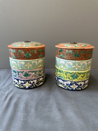 A pair of Chinese famille rose four-tier stacking boxes and a teapot, 19th C.