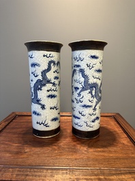 Two pairs of Chinese blue and white Nanking crackle-glazed 'dragon' vases and a dish, Chenghua mark, 19th C.