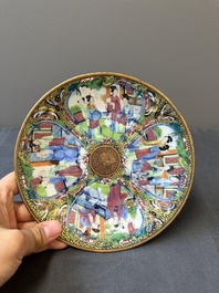 A pair of Chinese blue and white Canton-decorated plates, a famille rose 'playing boys' plate and a reticulated plate, 19th C.