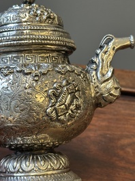 A fine Tibetan silver plated 'bajixiang' teapot, 19th C.