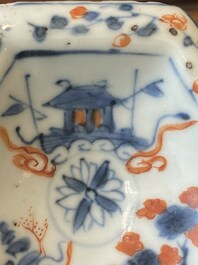 Een paar Chinese blauw-witte vazen en vier zoutvaten in blauw-wit, famille rose en Imari-stijl, Kangxi/Qianlong