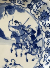 A pair of Chinese blue and white 'Mongolian hunting scene' plates and a pair of plates with floral design, Chenghua and Kangxi mark, Kangxi