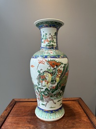 A Chinese famille verte vase with warriors on horseback, 19th C.