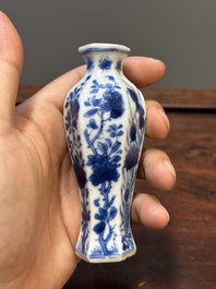 Two Chinese blue and white vases, two miniature jugs and a tea caddy, Kangxi