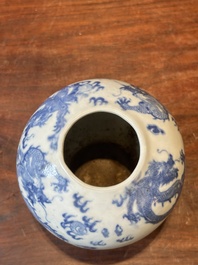 A pair of Chinese blue and white covered vases and three jars, 19th C.