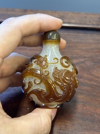 A rare Chinese brown-overlay white glass snuff bottle with chilong design, Qianlong/Jiaqing