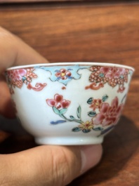 Nine Chinese famille rose cups and eight saucers, Yongzheng/Qianlong
