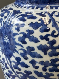 A Chinese blue and white 'lotus scroll' jar with wooden cover and stand, Kangxi