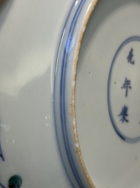 A Chinese doucai plate with pomegranates, plums and grapes, Chenghua mark, Kangxi