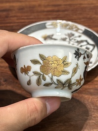 A pair of Chinese grisaille and gilt 'pheasant' cups and saucers, Yongzheng
