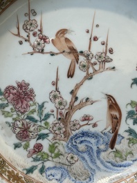 A pair of Chinese famille rose 'magpie and peony' plates with bianco-sopra-bianco rims, Yongzheng