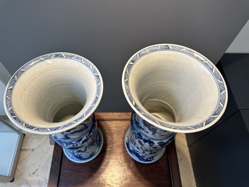 Two Chinese blue and white 'gu' vases with squirrels among grape vines, Kangxi