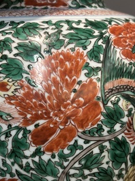 A pair of Chinese wucai 'phoenix and peony scroll' vases, Transitional period