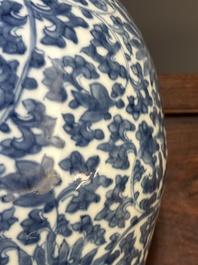 A Chinese blue and white 'lotus scroll' vase and cover, Kangxi
